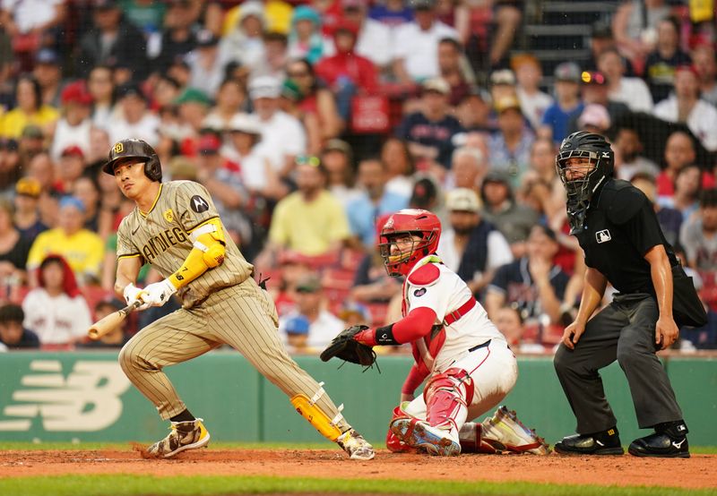 Jun 30, 2024; Boston, Massachusetts, USA; San Diego Padres shortstop Ha-Seong Kim (7) hits a double to left field to drive in a run against the Boston Red Sox in the seventh inning at Fenway Park. Mandatory Credit: David Butler II-USA TODAY Sports