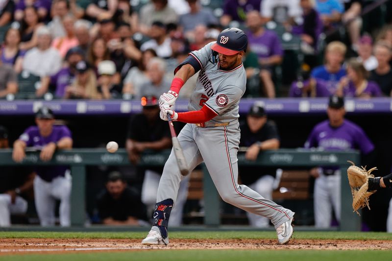 Jun 21, 2024; Denver, Colorado, USA; Washington Nationals second baseman Luis Garcia Jr. (2) hits a three run home run in the third inning against the Colorado Rockies at Coors Field. Mandatory Credit: Isaiah J. Downing-USA TODAY Sports