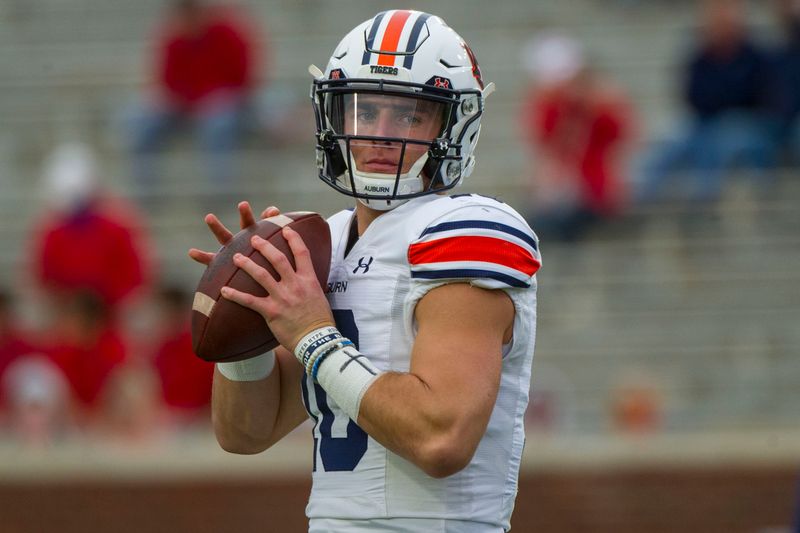 Oct 24, 2020; Oxford, Mississippi, USA; Auburn Tigers quarterback Bo Nix (10) warms up before the game against the Mississippi Rebels  at Vaught-Hemingway Stadium. Mandatory Credit: Justin Ford-USA TODAY Sports