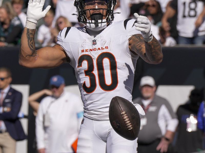 Cincinnati Bengals running back Chase Brown reacts after scoring a touchdown against the Philadelphia Eagles during the second half of an NFL football game, Sunday, Oct. 27, 2024 in Cincinnati. (AP Photo/Jeff Dean)