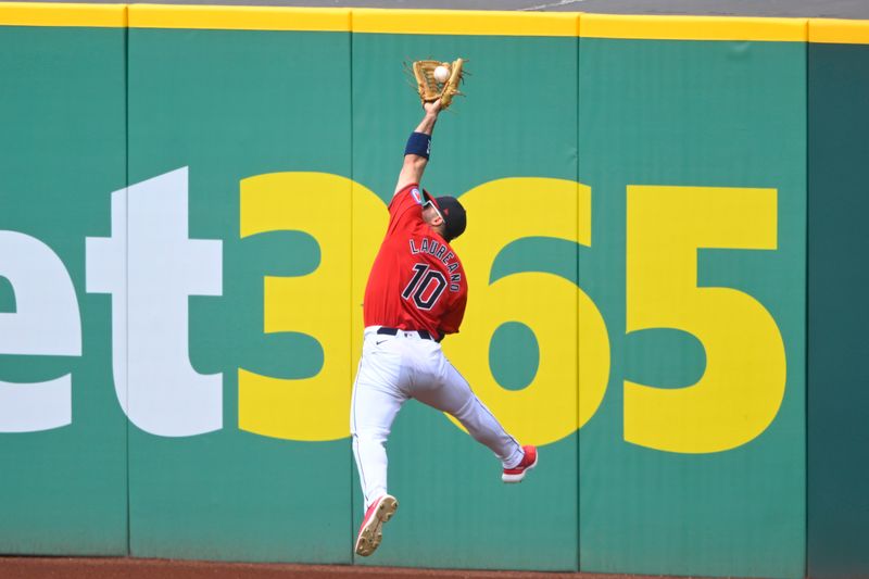 May 5, 2024; Cleveland, Ohio, USA; Cleveland Guardians right fielder Ramon Laureano (10) makes a leaping catch in the sixth inning against the Los Angeles Angels at Progressive Field. Mandatory Credit: David Richard-USA TODAY Sports