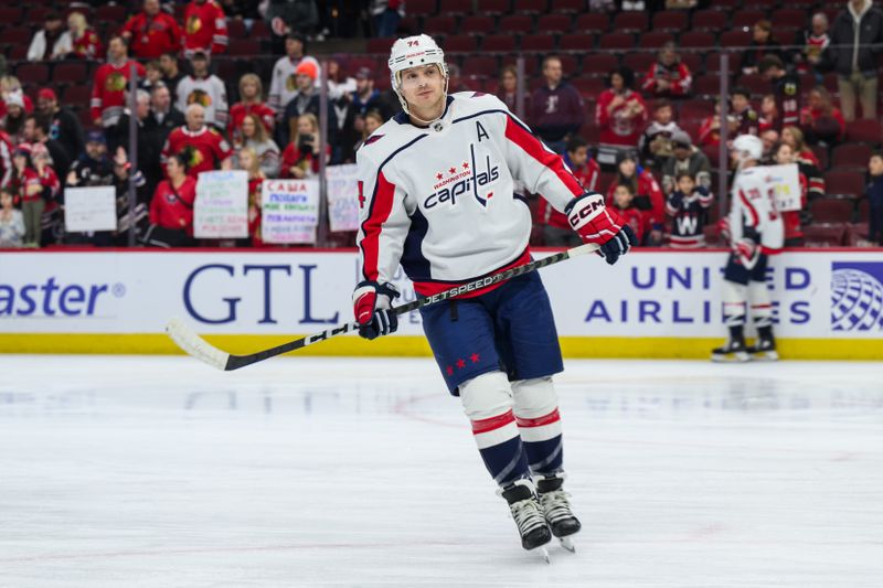 Dec 10, 2023; Chicago, Illinois, USA; Washington Capitals defenseman John Carlson (74) warms up against the Chicago Blackhawks before the game at the United Center. Mandatory Credit: Daniel Bartel-USA TODAY Sports