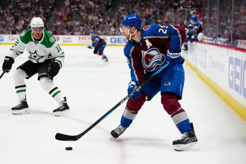 May 17, 2024; Denver, Colorado, USA; Colorado Avalanche center Nathan MacKinnon (29) controls the puck in an overtime period against the Dallas Stars in game six of the second round of the 2024 Stanley Cup Playoffs at Ball Arena. Mandatory Credit: Ron Chenoy-USA TODAY Sports