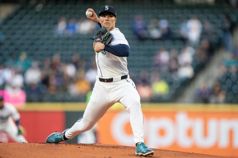 Sep 11, 2024; Seattle, Washington, USA;  Seattle Mariners starter Bryan Woo (22) delivers a pitch during the first inning against the San Diego Padres at T-Mobile Park. Mandatory Credit: Stephen Brashear-Imagn Images