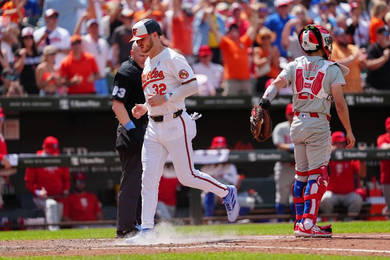 Jun 16, 2024; Baltimore, Maryland, USA; Baltimore Orioles designated hitter Ryan O'Hearn (32) scores a run on Baltimore Orioles second baseman Jordan Westburg’s (not pictured) three-run home run against the Philadelphia Phillies during the fifth inning at Oriole Park at Camden Yards. Mandatory Credit: Gregory Fisher-USA TODAY Sports