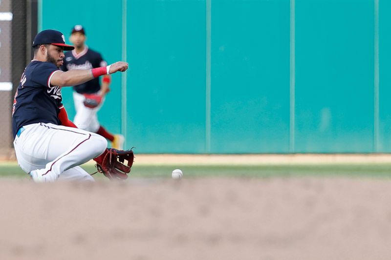 May 21, 2024; Washington, District of Columbia, USA; Washington Nationals second base Luis García Jr. (2) fields a ground ball hit by Minnesota Twins catcher Ryan Jeffers (not pictured) during the first inning at Nationals Park. Mandatory Credit: Geoff Burke-USA TODAY Sports