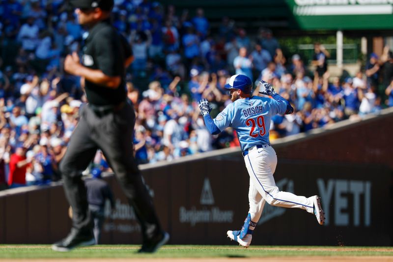 Sep 26, 2025; Chicago, Illinois, USA; Chicago Cubs first baseman Michael Busch (29) rounds the bases after hitting a solo home run against the St. Louis Cardinals during the fifth inning at Wrigley Field. Mandatory Credit: Kamil Krzaczynski-Imagn Images
