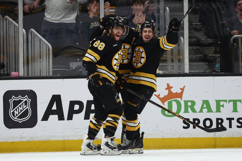 Jan 27, 2026; Boston, Massachusetts, USA; Boston Bruins right wing David Pastrnak (88) celebrates with center Marat Khusnutdinov (92) after scoring the winning goal in overtime against the Nashville Predators at TD Garden. Mandatory Credit: Winslow Townson-Imagn Images