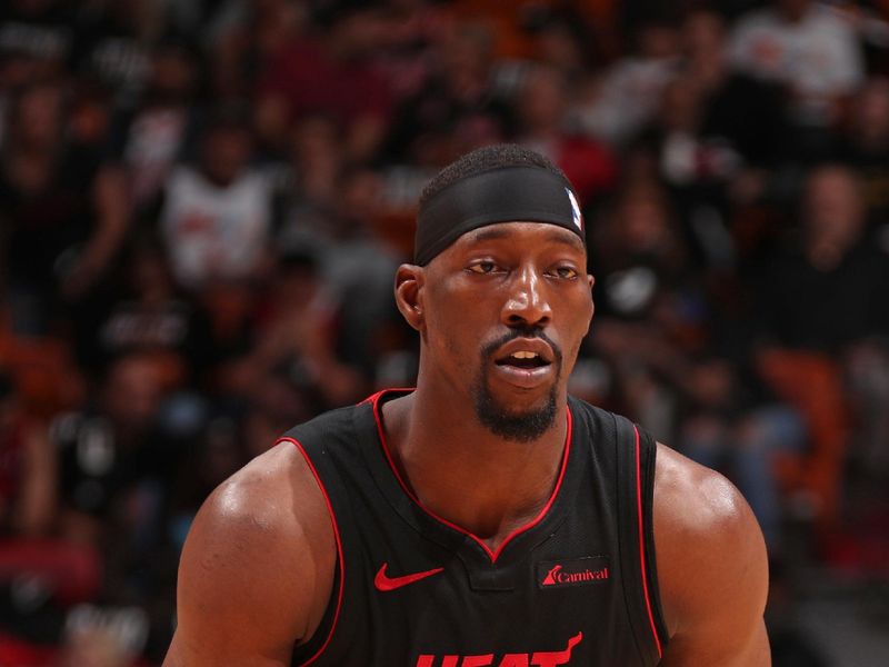 MIAMI, FL - JANUARY 19: Bam Adebayo #13 of the Miami Heat handles the ball during the game against the Atlanta Hawks on January 19, 2024 at Kaseya Center in Miami, Florida. NOTE TO USER: User expressly acknowledges and agrees that, by downloading and or using this Photograph, user is consenting to the terms and conditions of the Getty Images License Agreement. Mandatory Copyright Notice: Copyright 2024 NBAE (Photo by Issac Baldizon/NBAE via Getty Images)