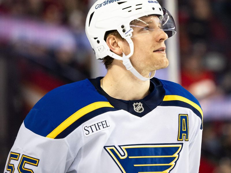 Dec 5, 2024; Calgary, Alberta, CAN; St. Louis Blues defenseman Colton Parayko (55) looks on during the second period against the Calgary Flames at Scotiabank Saddledome. Mandatory Credit: Brett Holmes-Imagn Images