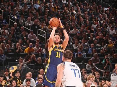 SAN FRANCISCO, CA - DECEMBER 30: Klay Thompson #11 of the Golden State Warriors shoots the ball during the game against the Dallas Mavericks on December 30, 2023 at Chase Center in San Francisco, California. NOTE TO USER: User expressly acknowledges and agrees that, by downloading and or using this photograph, user is consenting to the terms and conditions of Getty Images License Agreement. Mandatory Copyright Notice: Copyright 2023 NBAE (Photo by Jed Jacobsohn/NBAE via Getty Images)