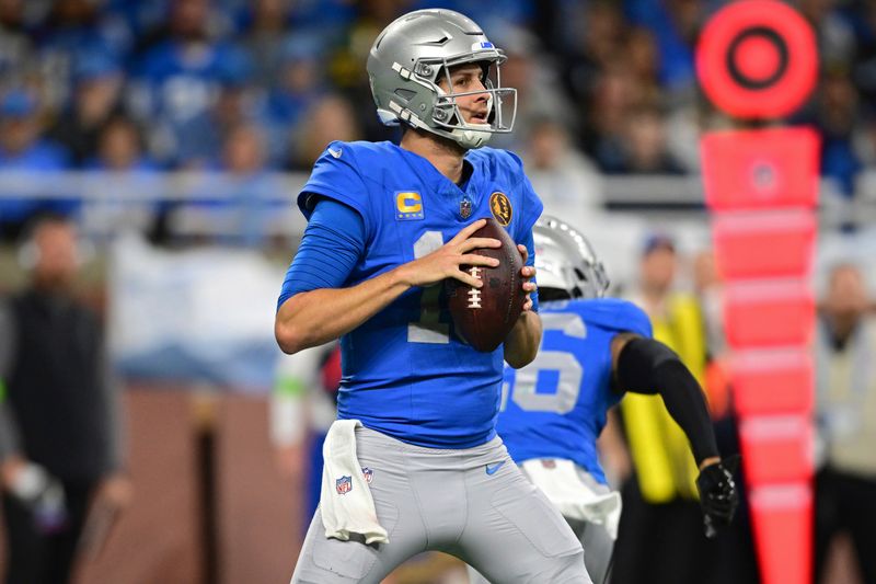 Detroit Lions quarterback Jared Goff looks to pass during the first half of an NFL football game against the Green Bay Packers, Thursday, Nov. 23, 2023, in Detroit. The Packers won 29-22. (AP Photo/David Dermer)