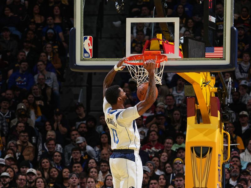 DENVER, CO - NOVEMBER 22: Naji Marshall #13 of the Dallas Mavericks dunks the ball during the game against the Denver Nuggets during the Emirates NBA Cup game on November 22, 2024 at Ball Arena in Denver, Colorado. NOTE TO USER: User expressly acknowledges and agrees that, by downloading and/or using this Photograph, user is consenting to the terms and conditions of the Getty Images License Agreement. Mandatory Copyright Notice: Copyright 2024 NBAE (Photo by Garrett Ellwood/NBAE via Getty Images)