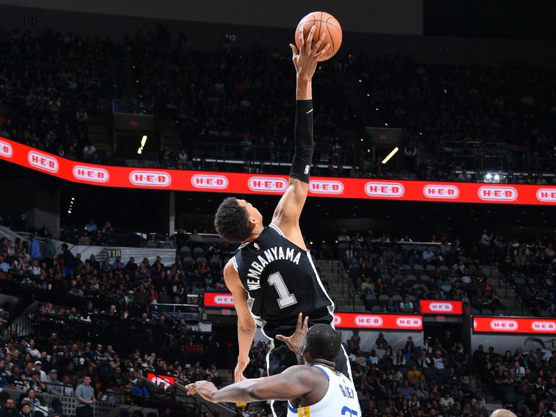 SAN ANTONIO, TX - MARCH 11:  Victor Wembanyama #1 of the San Antonio Spurs grabs a rebound during the game against the Golden State Warriors on March 11, 2024 at the Frost Bank Center in San Antonio, Texas. NOTE TO USER: User expressly acknowledges and agrees that, by downloading and or using this photograph, user is consenting to the terms and conditions of the Getty Images License Agreement. Mandatory Copyright Notice: Copyright 2024 NBAE (Photos by Michael Gonzales/NBAE via Getty Images)