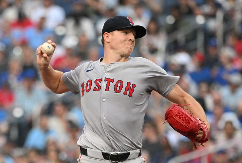 Jun 17, 2024; Toronto, Ontario, CAN;  Boston Red Sox starting pitcher Nick Pivetta (37) delivers a pitch against the Toronto Blue Jays in the first inning at Rogers Centre. Mandatory Credit: Dan Hamilton-USA TODAY Sports