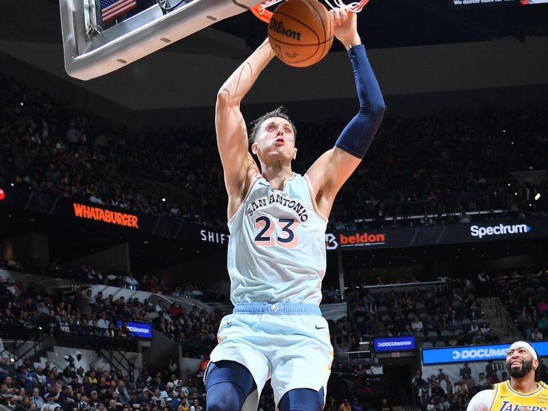 SAN ANTONIO, TX - NOVEMBER 27: Zach Collins #23 of the San Antonio Spurs dunks the ball during the game against the Los Angeles Lakers on November 27, 2024 at the Frost Bank Center in San Antonio, Texas. NOTE TO USER: User expressly acknowledges and agrees that, by downloading and or using this photograph, user is consenting to the terms and conditions of the Getty Images License Agreement. Mandatory Copyright Notice: Copyright 2024 NBAE (Photos by Michael Gonzales/NBAE via Getty Images)