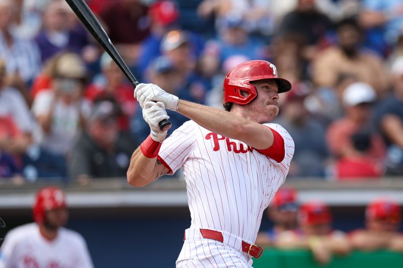 Mar 4, 2025; Clearwater, Florida, USA; Philadelphia Phillies outfielder Max Kepler (17) hits a home run against the New York Yankees in the second inning during spring training at BayCare Ballpark. Mandatory Credit: Nathan Ray Seebeck-Imagn Images