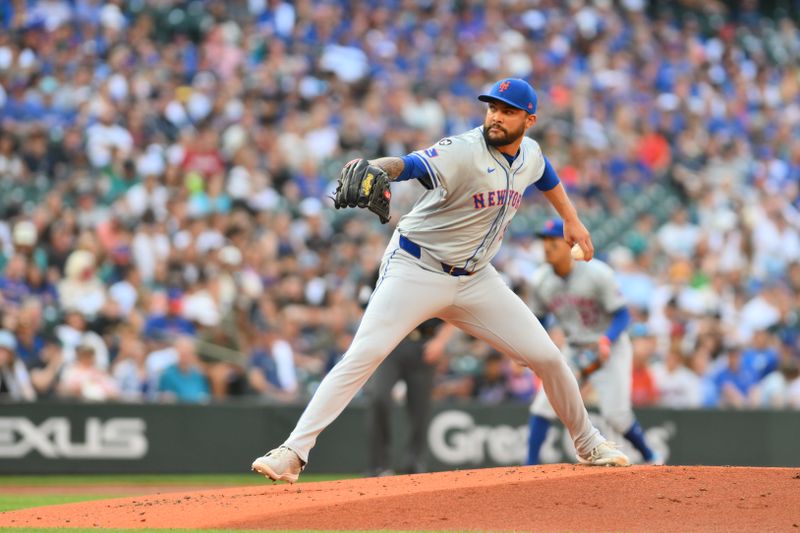 Aug 10, 2024; Seattle, Washington, USA; New York Mets starting pitcher Sean Manaea (59) pitches to the Seattle Mariners during the first inning at T-Mobile Park. Mandatory Credit: Steven Bisig-USA TODAY Sports