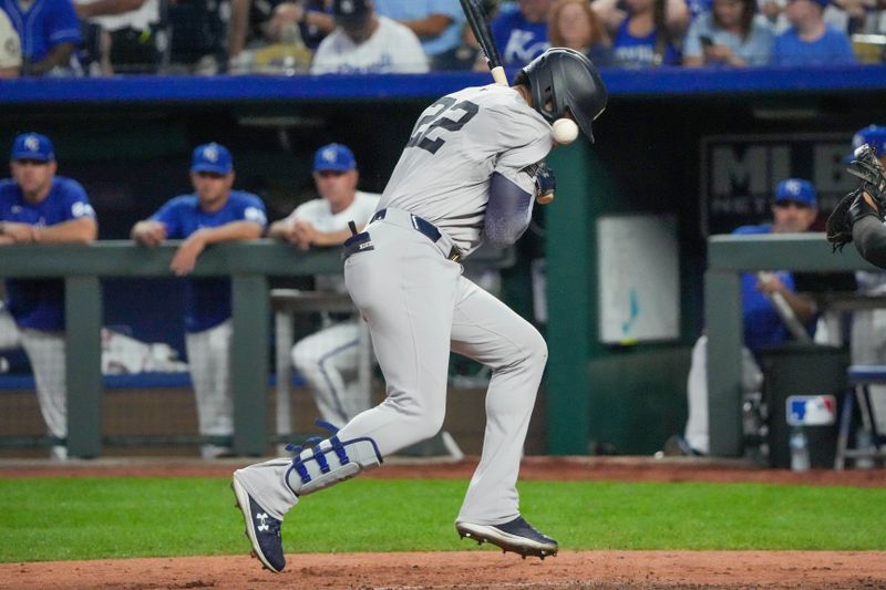 Jun 12, 2024; Kansas City, Missouri, USA; New York Yankees right fielder Juan Soto (22) is hit by a pitch against the Kansas City Royals in the seventh inning at Kauffman Stadium. Mandatory Credit: Denny Medley-USA TODAY Sports