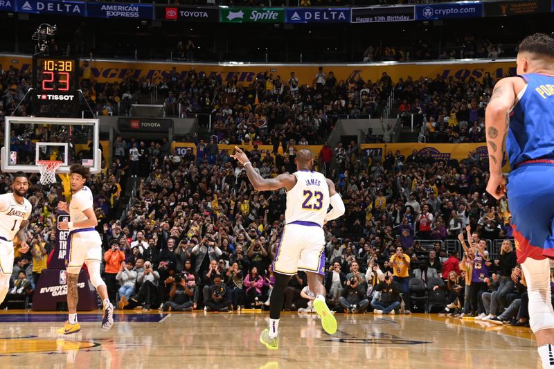 LOS ANGELES, CA - MARCH 2: LeBron James #23 of the Los Angeles Lakers celebrates after scoring his 40,000th career point during the game against the Denver Nuggets on March 2, 2024 at Crypto.Com Arena in Los Angeles, California. NOTE TO USER: User expressly acknowledges and agrees that, by downloading and/or using this Photograph, user is consenting to the terms and conditions of the Getty Images License Agreement. Mandatory Copyright Notice: Copyright 2024 NBAE (Photo by Andrew D. Bernstein/NBAE via Getty Images)