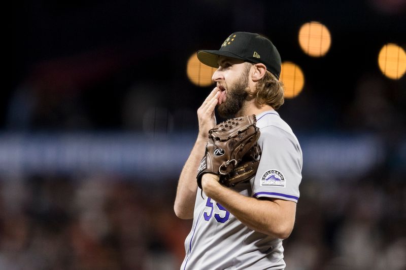 May 17, 2024; San Francisco, California, USA;  Colorado Rockies  relief pitcher Jake Bird (59) prepares to throw against the San Francisco Giants during the seventh inning at Oracle Park. Mandatory Credit: John Hefti-USA TODAY Sports