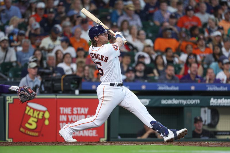 Jul 4, 2023; Houston, Texas, USA; Houston Astros shortstop Grae Kessinger (16) hits a home run during the third inning against the Colorado Rockies at Minute Maid Park. Mandatory Credit: Troy Taormina-USA TODAY Sports