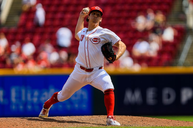 Jul 11, 2024; Cincinnati, Ohio, USA; Cincinnati Reds relief pitcher Lucas Sims (39) pitches against the Colorado Rockies in the ninth inning at Great American Ball Park. Mandatory Credit: Katie Stratman-USA TODAY Sports