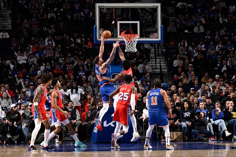 PHILADELPHIA, PA - JANUARY 5:  Isaiah Hartenstein #55 of the New York Knicks drives to the basket during the game against the Philadelphia 76ers on January 5, 2024 at the Wells Fargo Center in Philadelphia, Pennsylvania NOTE TO USER: User expressly acknowledges and agrees that, by downloading and/or using this Photograph, user is consenting to the terms and conditions of the Getty Images License Agreement. Mandatory Copyright Notice: Copyright 2024 NBAE (Photo by David Dow/NBAE via Getty Images)