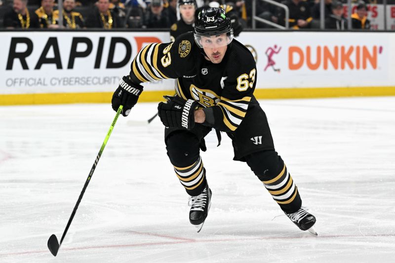 Apr 22, 2024; Boston, Massachusetts, USA; Boston Bruins left wing Brad Marchand (63) skates against the Toronto Maple Leafs during the first period in game two of the first round of the 2024 Stanley Cup Playoffs at TD Garden. Mandatory Credit: Brian Fluharty-USA TODAY Sports