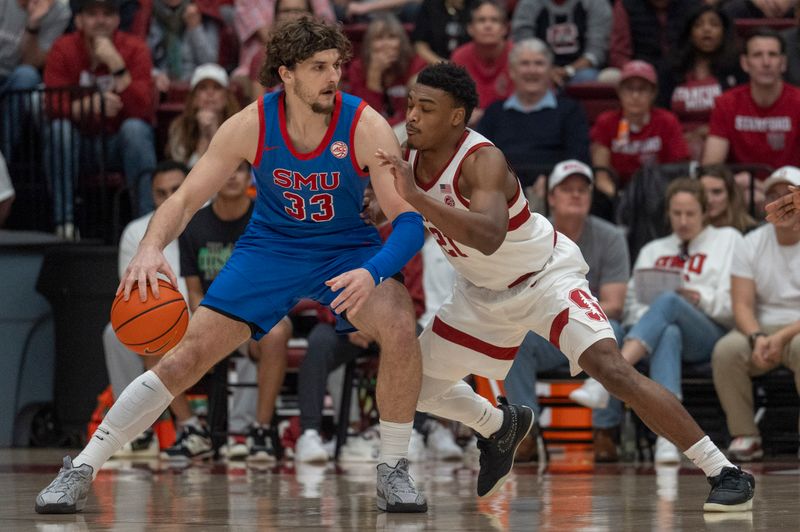 Mar 1, 2025; Stanford, California, USA;  Southern Methodist Mustangs forward Matt Cross (33) controls the ball during the first half against Stanford Cardinal guard Jaylen Blakes (21) at Maples Pavilion. Mandatory Credit: Stan Szeto-Imagn Images