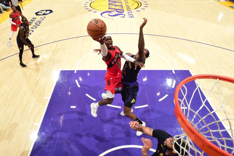 LOS ANGELES, CA - JANUARY 9: Dennis Schroder #17 of the Toronto Raptors drives to the basket during the game against the Los Angeles Lakers on January 9, 2024 at Crypto.Com Arena in Los Angeles, California. NOTE TO USER: User expressly acknowledges and agrees that, by downloading and/or using this Photograph, user is consenting to the terms and conditions of the Getty Images License Agreement. Mandatory Copyright Notice: Copyright 2024 NBAE (Photo by Adam Pantozzi/NBAE via Getty Images)