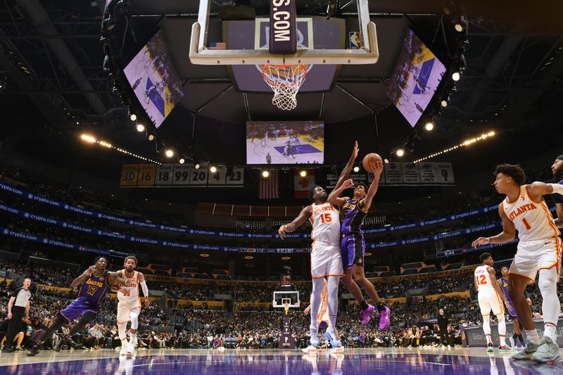 LOS ANGELES, CA - JANUARY 3: Max Christie #12 of the Los Angeles Lakers drives to the basket during the game against the Atlanta Hawks on January 3, 2025 at Crypto.Com Arena in Los Angeles, California. NOTE TO USER: User expressly acknowledges and agrees that, by downloading and/or using this Photograph, user is consenting to the terms and conditions of the Getty Images License Agreement. Mandatory Copyright Notice: Copyright 2025 NBAE (Photo by Adam Pantozzi/NBAE via Getty Images)