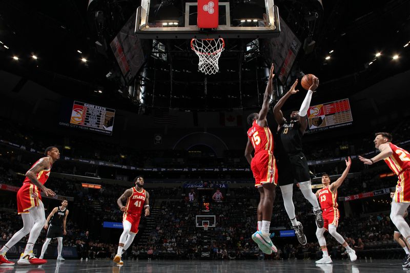 MEMPHIS, TN - MARCH 8: Jaren Jackson Jr. #13 of the Memphis Grizzlies drives to the basket during the game against the Atlanta Hawks on March 8, 2024 at FedExForum in Memphis, Tennessee. NOTE TO USER: User expressly acknowledges and agrees that, by downloading and or using this photograph, User is consenting to the terms and conditions of the Getty Images License Agreement. Mandatory Copyright Notice: Copyright 2024 NBAE (Photo by Joe Murphy/NBAE via Getty Images)