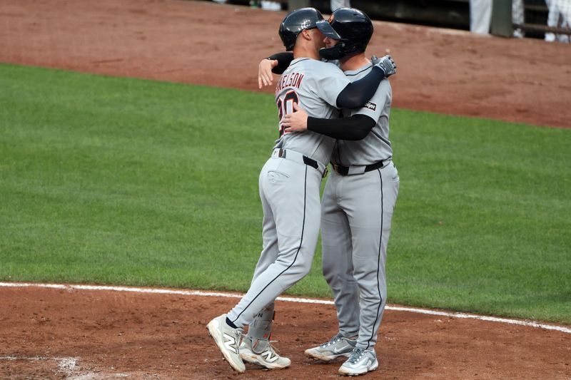 Jun 10, 2025; Baltimore, Maryland, USA; Detroit Tigers first baseman Spencer Torkelson (20) celebrates with catcher Dillon Dingler (13) during the fifth inning against the Baltimore Orioles at Oriole Park at Camden Yards. Mandatory Credit: Daniel Kucin Jr.-Imagn Images