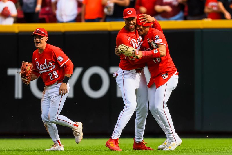 Sep 25, 2025; Cincinnati, Ohio, USA; Cincinnati Reds outfielder Will Benson (30) hugs outfielder Noelvi Marte (16) after the victory over the Pittsburgh Pirates at Great American Ball Park. Mandatory Credit: Katie Stratman-Imagn Images