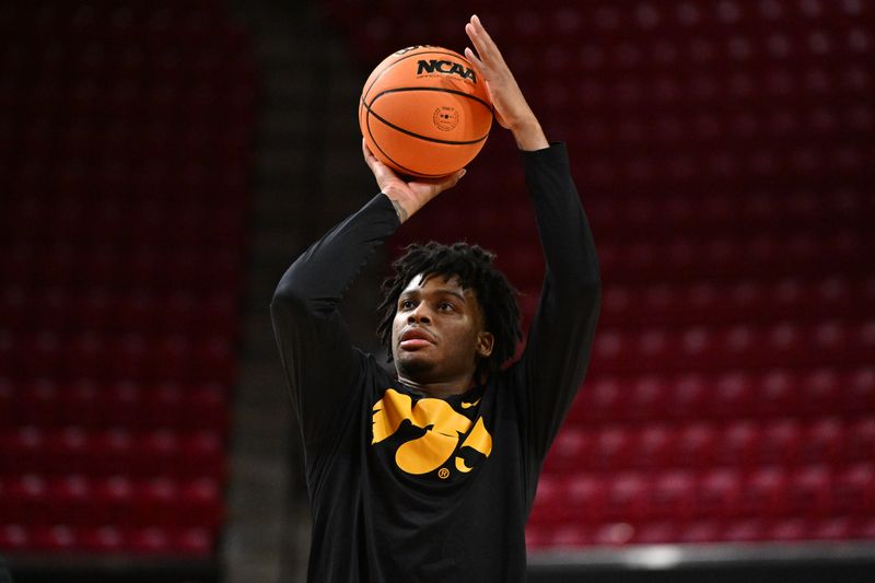 Feb 11, 2026; College Park, Maryland, USA;  Iowa Hawkeyes guard Tavion Banks (#6) warms up before a game against the Maryland Terrapins at Xfinity Center. Mandatory Credit: Jamie Sabau-Imagn Images