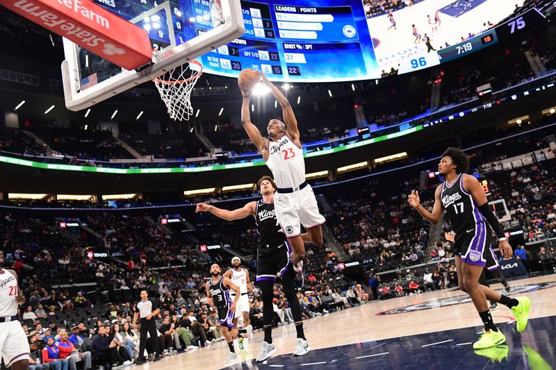 INGLEWOOD, CA - OCTOBER 17: Kai Jones #23 of the LA Clippers dunks the ball during the game against the Sacramento Kings during a NBA Preseason game on October 17, 2024 at Intuit Dome in Los Angeles, California. NOTE TO USER: User expressly acknowledges and agrees that, by downloading and/or using this Photograph, user is consenting to the terms and conditions of the Getty Images License Agreement. Mandatory Copyright Notice: Copyright 2024 NBAE (Photo by Adam Pantozzi/NBAE via Getty Images)