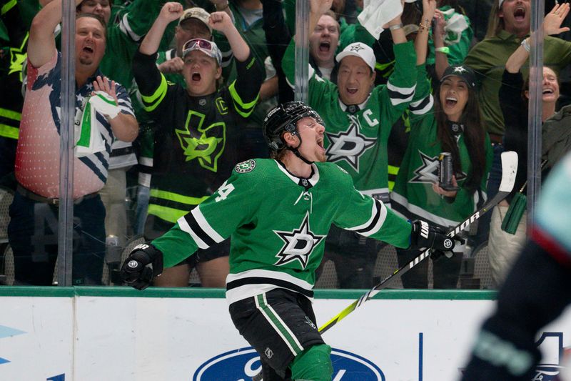 May 15, 2023; Dallas, Texas, USA; Dallas Stars center Roope Hintz (24) celebrates after he scores a goal on a breakaway shot against Seattle Kraken goaltender Philipp Grubauer (not pictured) during the second period in game seven of the second round of the 2023 Stanley Cup Playoffs at the American Airlines Center. Mandatory Credit: Jerome Miron-USA TODAY Sports