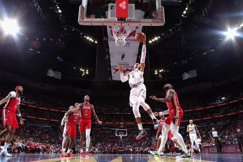 NEW ORLEANS, LA - NOVEMBER 15: Russell Westbrook #4 of the Denver Nuggets drives to the basket during the game against the New Orleans Pelicans during the Emirates NBA Cup game on November 15, 2024 at the Smoothie King Center in New Orleans, Louisiana. NOTE TO USER: User expressly acknowledges and agrees that, by downloading and or using this Photograph, user is consenting to the terms and conditions of the Getty Images License Agreement. Mandatory Copyright Notice: Copyright 2024 NBAE (Photo by Layne Murdoch Jr./NBAE via Getty Images)