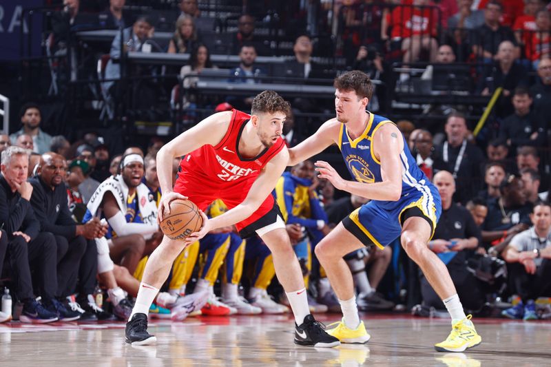 HOUSTON, TX - APRIL 30: Alperen Sengun #28 of the Houston Rockets looks on during the game against the Golden State Warriors during Round 1 Game 5 of the 2025 NBA Playoffs on April 30, 2025 at the Toyota Center in Houston, Texas. NOTE TO USER: User expressly acknowledges and agrees that, by downloading and or using this photograph, User is consenting to the terms and conditions of the Getty Images License Agreement. Mandatory Copyright Notice: Copyright 2025 NBAE(Photo by Logan Riely/NBAE via Getty Images)