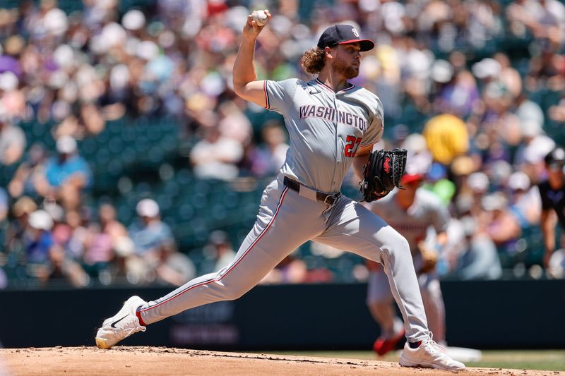 Jun 23, 2024; Denver, Colorado, USA; Washington Nationals starting pitcher Jake Irvin (27) pitches in the first inning against the Colorado Rockies at Coors Field. Mandatory Credit: Isaiah J. Downing-USA TODAY Sports