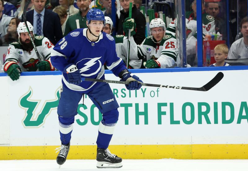 Jan 18, 2024; Tampa, Florida, USA; Tampa Bay Lightning defenseman Emil Martinsen Lilleberg (78) skates against the Minnesota Wild during the first period at Amalie Arena. Mandatory Credit: Kim Klement Neitzel-USA TODAY Sports