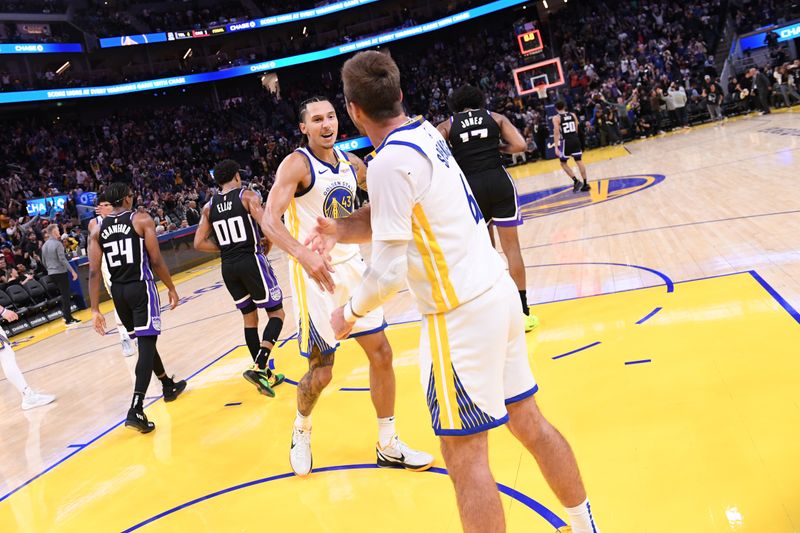 SAN FRANCISCO, CA - OCTOBER 11: Lindy Waters III #43 and Pat Spencer #61 of the Golden State Warriors high five after the game against the Sacramento Kings during a NBA Preseason game on October 11, 2024 at Chase Center in San Francisco, California. NOTE TO USER: User expressly acknowledges and agrees that, by downloading and or using this photograph, user is consenting to the terms and conditions of Getty Images License Agreement. Mandatory Copyright Notice: Copyright 2024 NBAE (Photo by Noah Graham/NBAE via Getty Images)