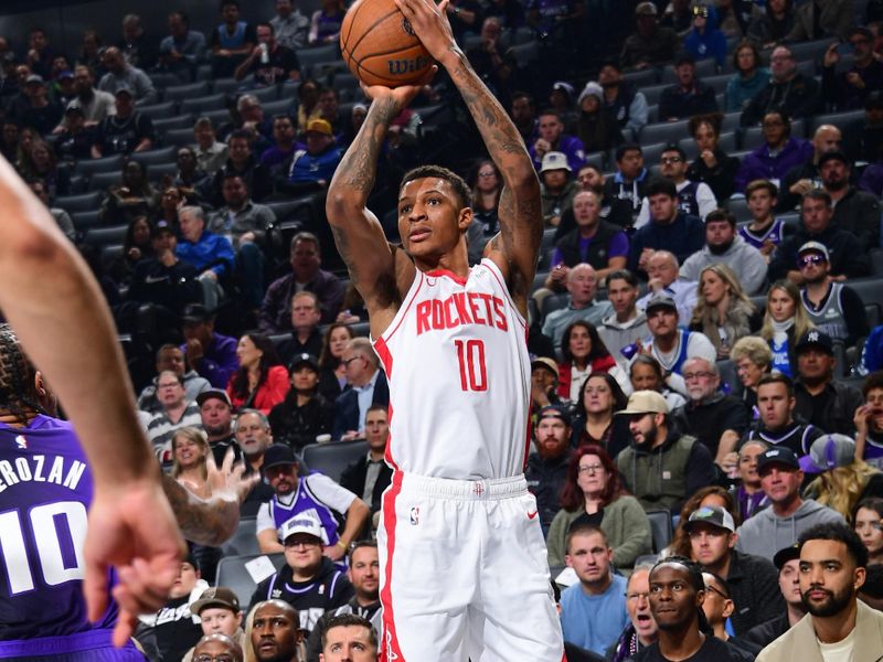 SACRAMENTO, CA - DECEMBER 3: Jabari Smith Jr. #10 of the Houston Rockets shoots the ball during the game against the Sacramento Kings during the Emirates NBA Cup game on December 3, 2024 at Golden 1 Center in Sacramento, California. NOTE TO USER: User expressly acknowledges and agrees that, by downloading and or using this Photograph, user is consenting to the terms and conditions of the Getty Images License Agreement. Mandatory Copyright Notice: Copyright 2024 NBAE (Photo by Adam Pantozzi/NBAE via Getty Images)