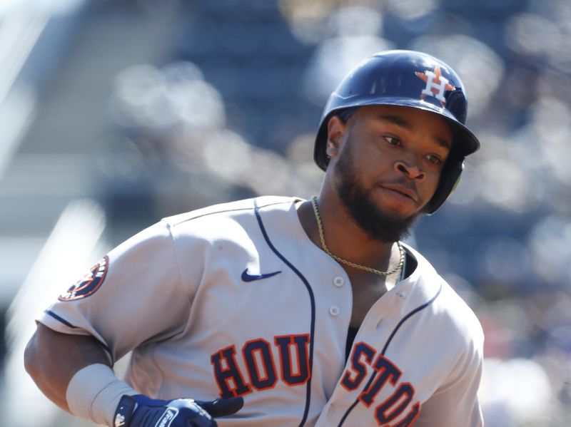 Apr 12, 2023; Pittsburgh, Pennsylvania, USA;  Houston Astros left fielder Corey Julks (9) circles the bases on his first career MLB home run against the Pittsburgh Pirates during the fourth inning at PNC Park. Mandatory Credit: Charles LeClaire-USA TODAY Sports