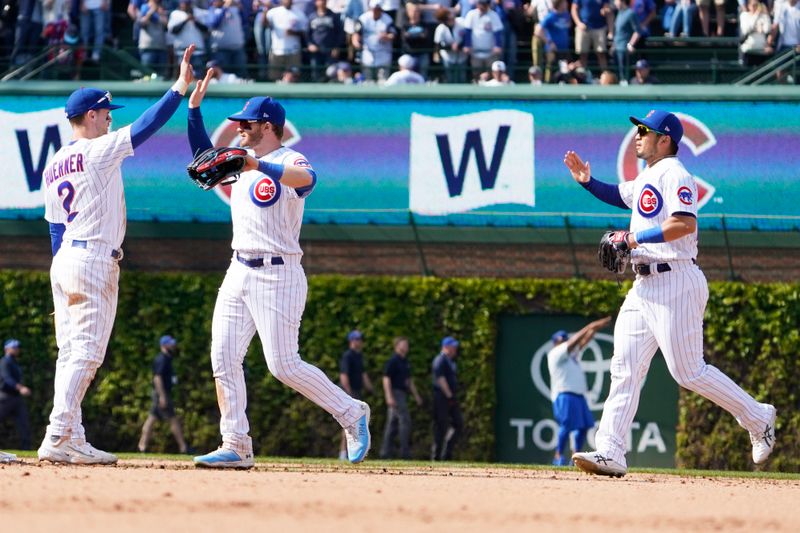 May 6, 2023; Chicago, Illinois, USA; The Chicago Cubs celebrate their win against the Miami Marlins at Wrigley Field. Mandatory Credit: David Banks-USA TODAY Sports