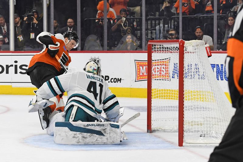 Nov 11, 2024; Philadelphia, Pennsylvania, USA; Philadelphia Flyers right wing Matvei Michkov (39) scores a goal against San Jose Sharks goaltender Vitek Vanecek (41) during the shootout period at Wells Fargo Center. Mandatory Credit: Eric Hartline-Imagn Images