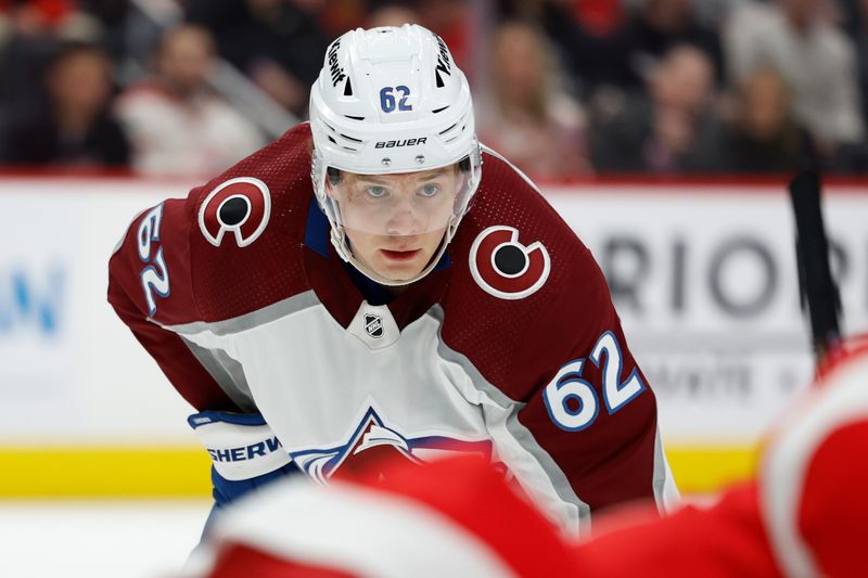 Feb 22, 2024; Detroit, Michigan, USA;  Colorado Avalanche left wing Artturi Lehkonen (62) gets set during a face off in the first period against the Detroit Red Wings at Little Caesars Arena. Mandatory Credit: Rick Osentoski-USA TODAY Sports