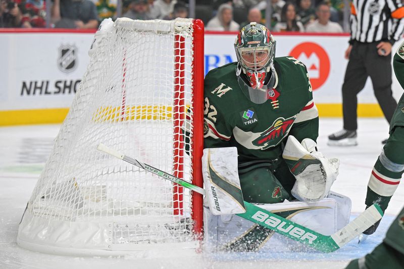 Oct 11, 2025; Saint Paul, Minnesota, USA;  Minnesota Wild goalie Filip Gustavsson (32) follows the play against the Columbus Blue Jackets during the third period at Grand Casino Arena. Mandatory Credit: Nick Wosika-Imagn Images