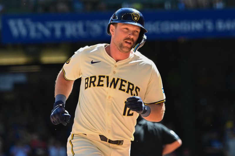 Sep 2, 2024; Milwaukee, Wisconsin, USA; Milwaukee Brewers first baseman Rhys Hoskins (12) runs the bases after hitting a 2-run home run in the fourth inning against the St. Louis Cardinals at American Family Field. Mandatory Credit: Benny Sieu-USA TODAY Sports